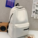 高校生のシンプルな無地のカジュアルリュックサック。アウトドア通勤に適しており、広々としていて、軽量で、汎用性があり、ラップトップ用に設計されています。